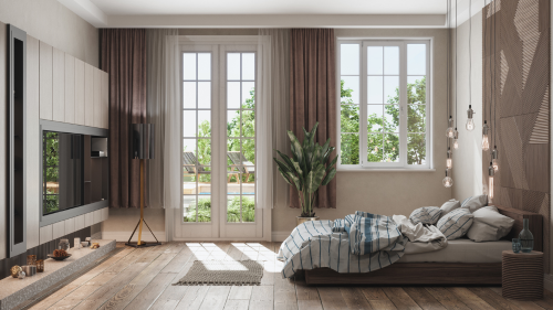 A modern living room featuring a large, wooden finish uPVC window with multiple panes.